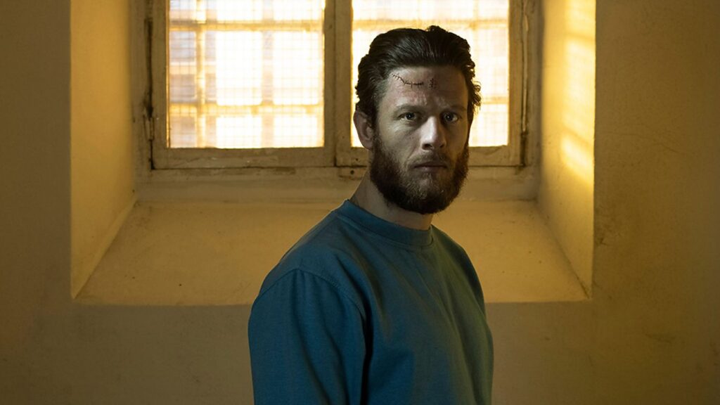 James Norton as Tommy Lee Royce, in a prison cell