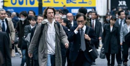 Ansel Elgort in the streets of Tokyo in Tokyo Viceroy